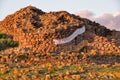 Sardinia. Gonnesa. Archaeological area of Ã¢â¬â¹Ã¢â¬â¹Seruci. October 13, 2020. Banner hanging on a tower of the Nuraghe Seruci